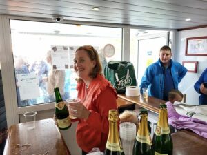 Karen Cottrell pouring Champagne